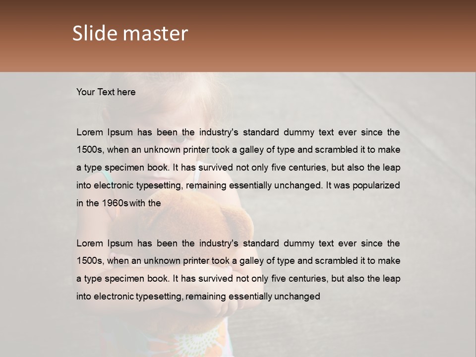 A Little Girl Holding A Teddy Bear In Her Arms PowerPoint Template