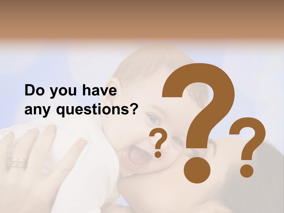 A Woman Holding A Baby In Her Arms PowerPoint Template