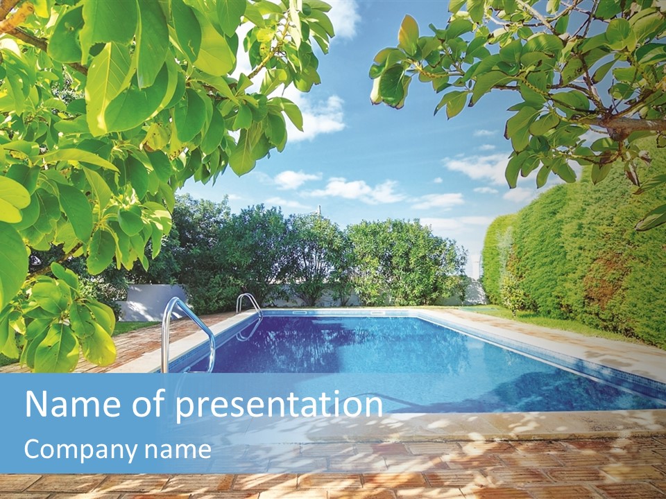 A Pool Surrounded By Trees With A Blue Sky In The Background PowerPoint Template