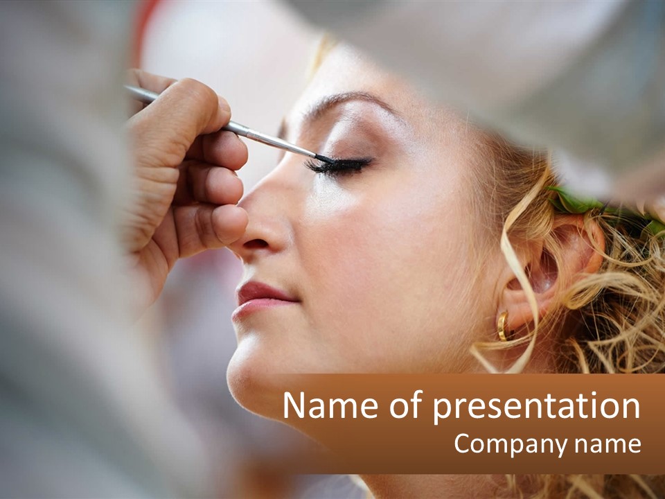 A Woman Getting Her Makeup Done By A Professional Makeup Artist PowerPoint Template