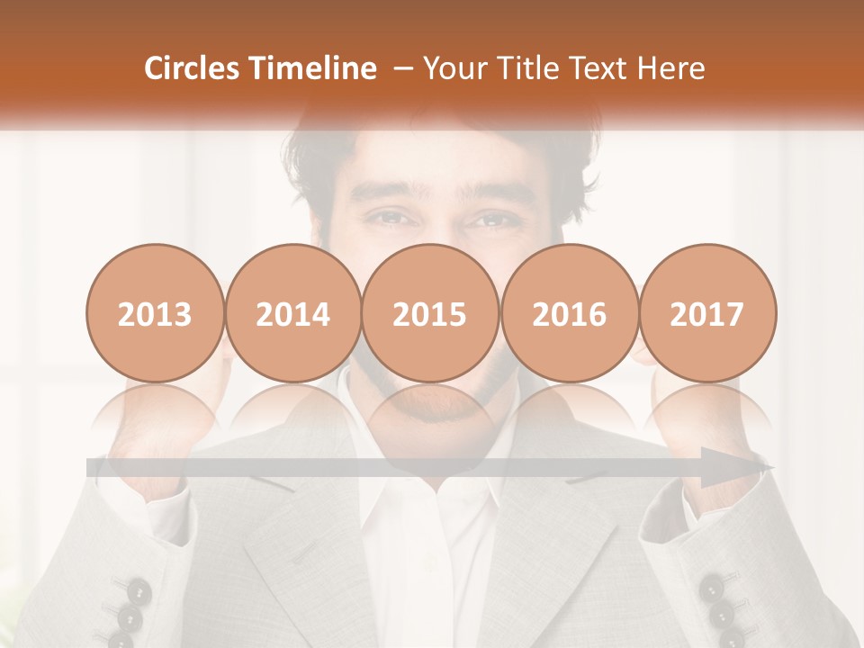 A Man In A Suit Is Holding His Fists Up PowerPoint Template