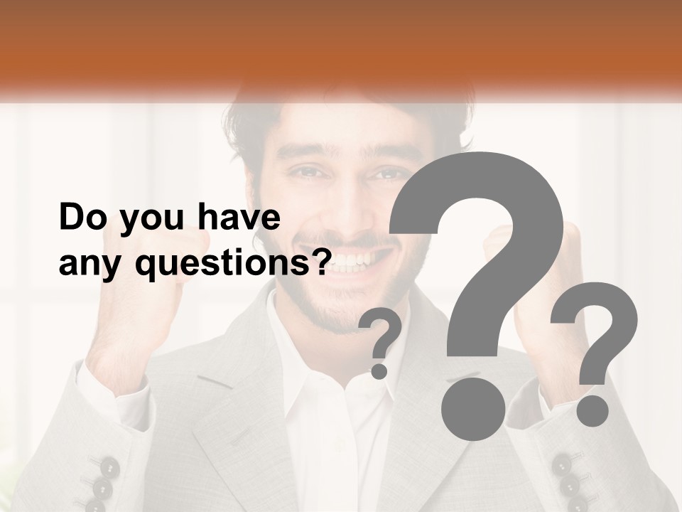 A Man In A Suit Is Holding His Fists Up PowerPoint Template