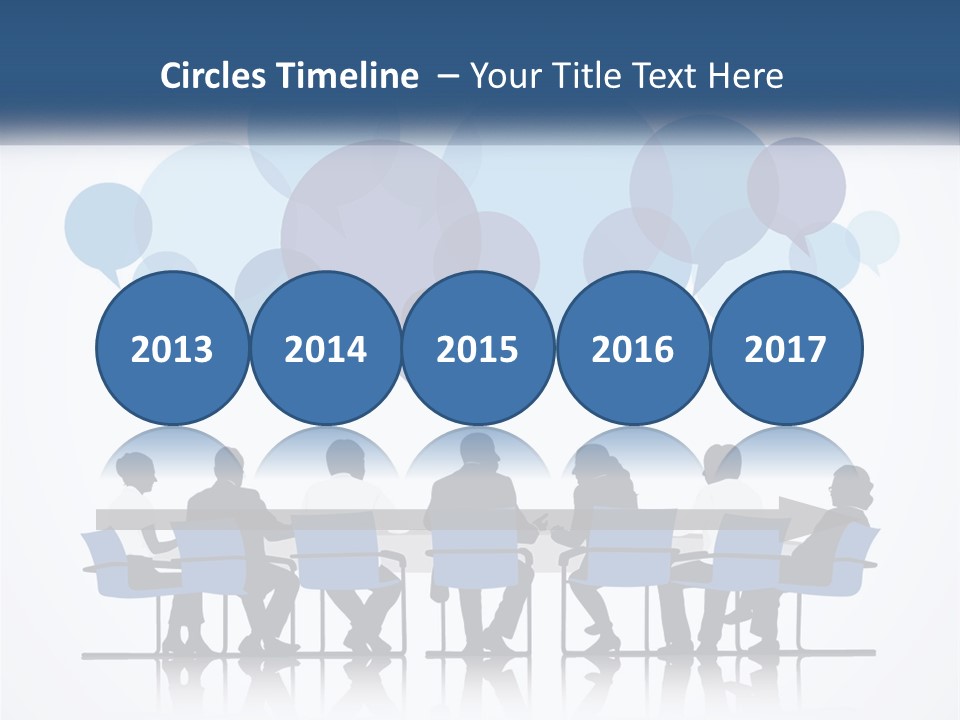 A Group Of People Sitting At A Table With Laptops PowerPoint Template