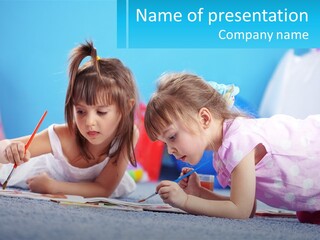 Two Little Girls Laying On The Floor Writing On Paper PowerPoint Template
