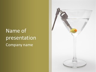 A Martini Glass With An Olive In It PowerPoint Template