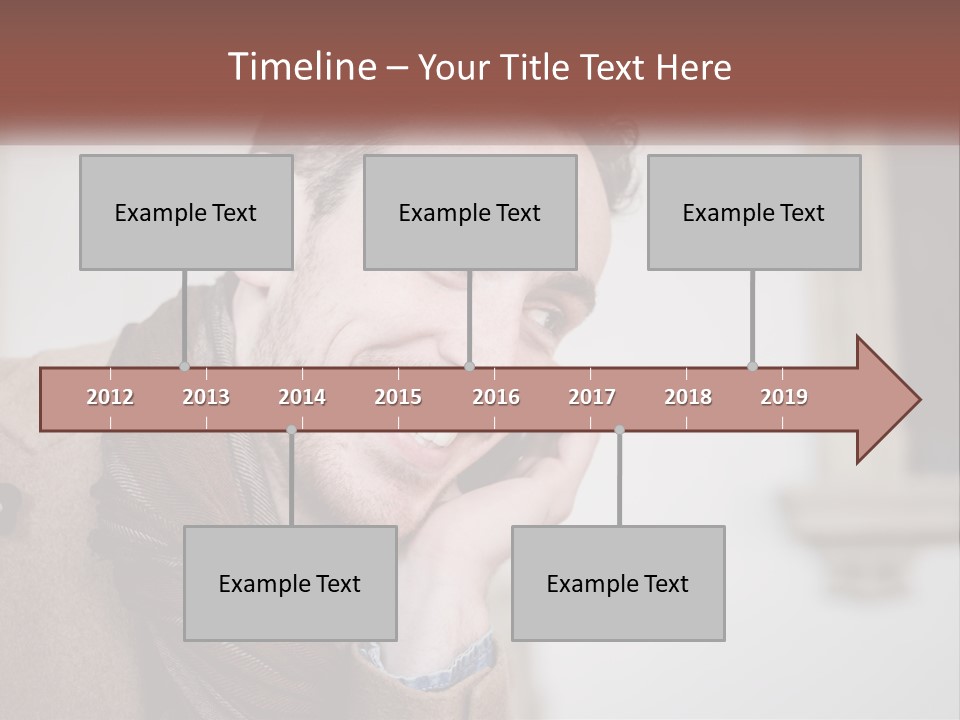 A Man Smiling While Talking On A Cell Phone PowerPoint Template