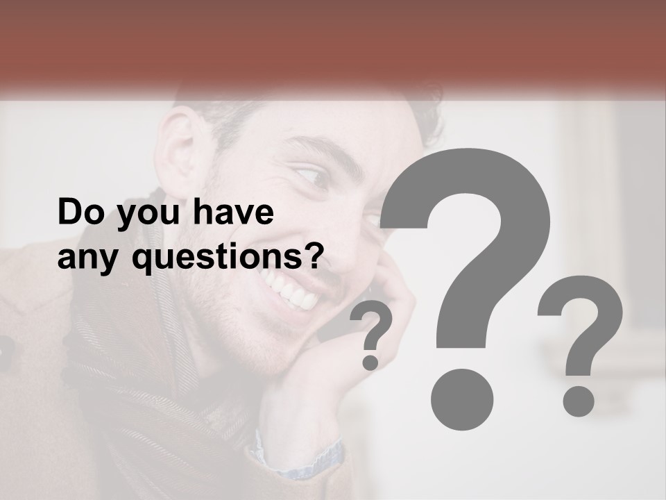 A Man Smiling While Talking On A Cell Phone PowerPoint Template