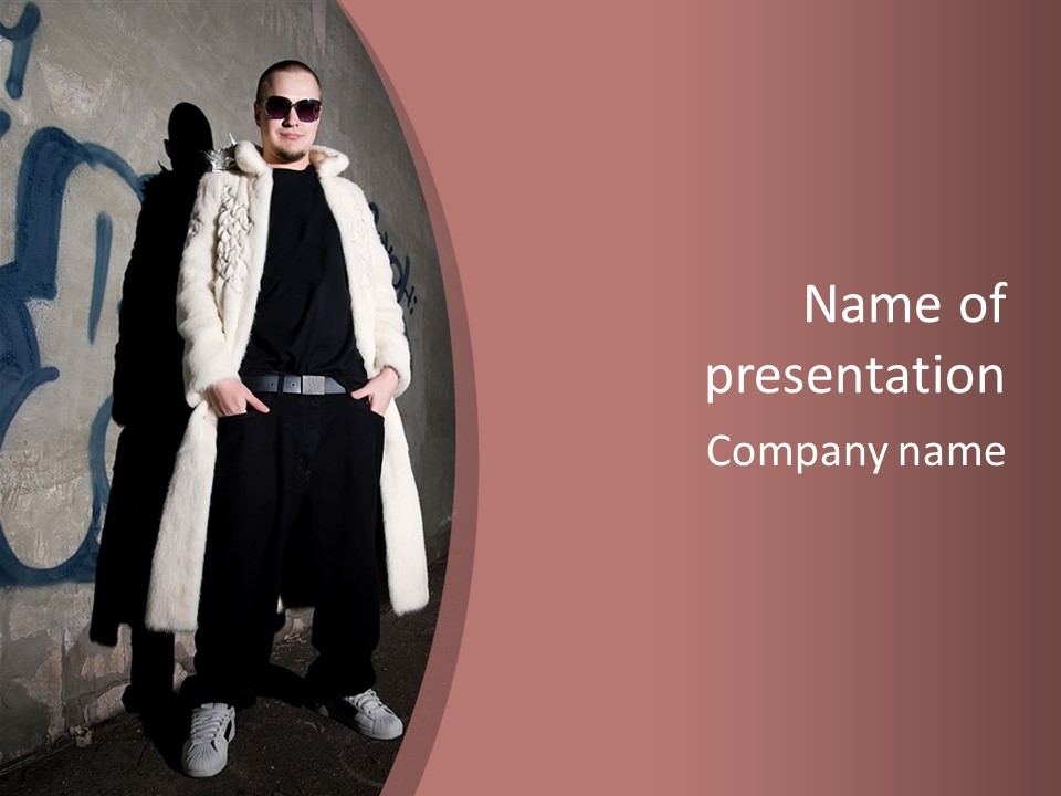 A Man Standing In Front Of A Wall With Graffiti On It PowerPoint Template