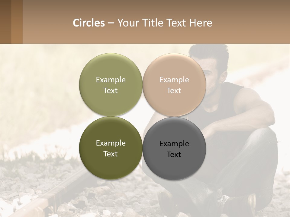 A Man Sitting On A Train Track Talking On A Cell Phone PowerPoint Template