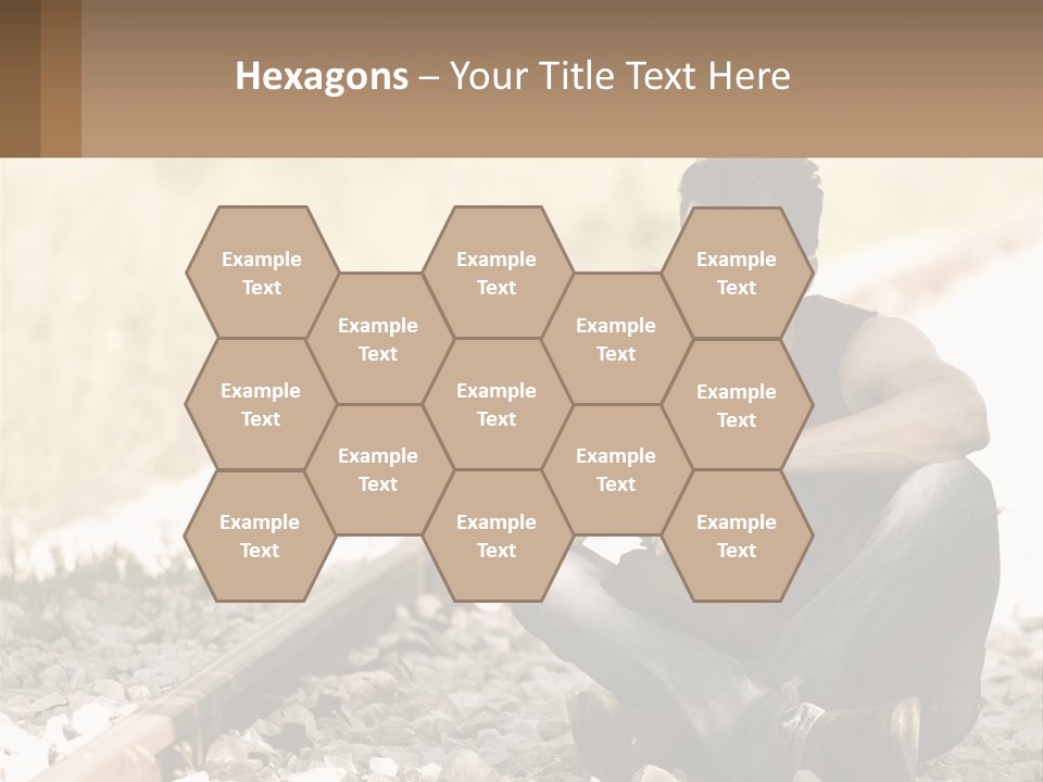 A Man Sitting On A Train Track Talking On A Cell Phone PowerPoint Template