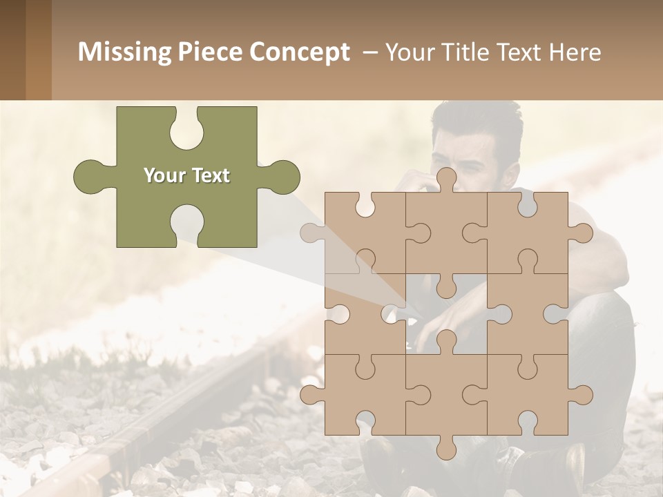 A Man Sitting On A Train Track Talking On A Cell Phone PowerPoint Template