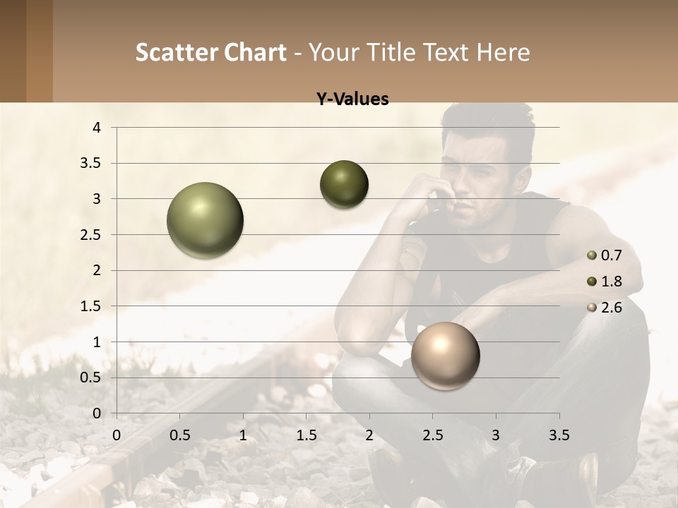 A Man Sitting On A Train Track Talking On A Cell Phone PowerPoint Template