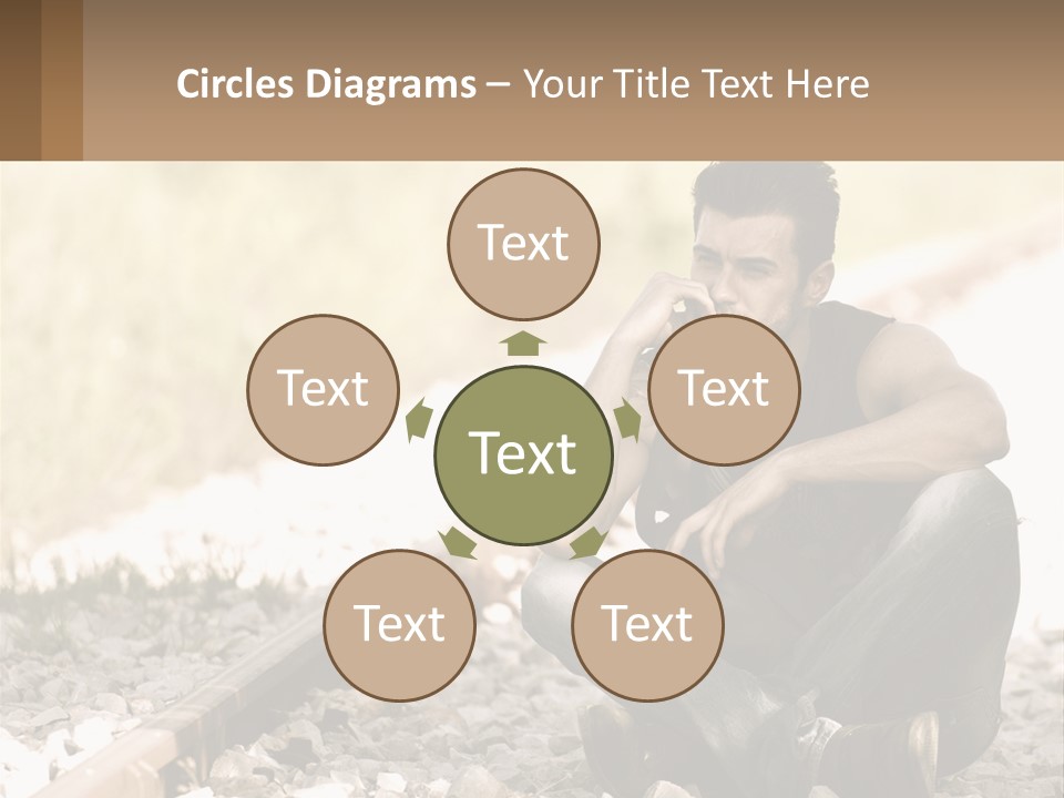 A Man Sitting On A Train Track Talking On A Cell Phone PowerPoint Template