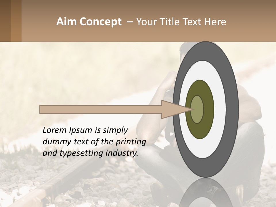 A Man Sitting On A Train Track Talking On A Cell Phone PowerPoint Template