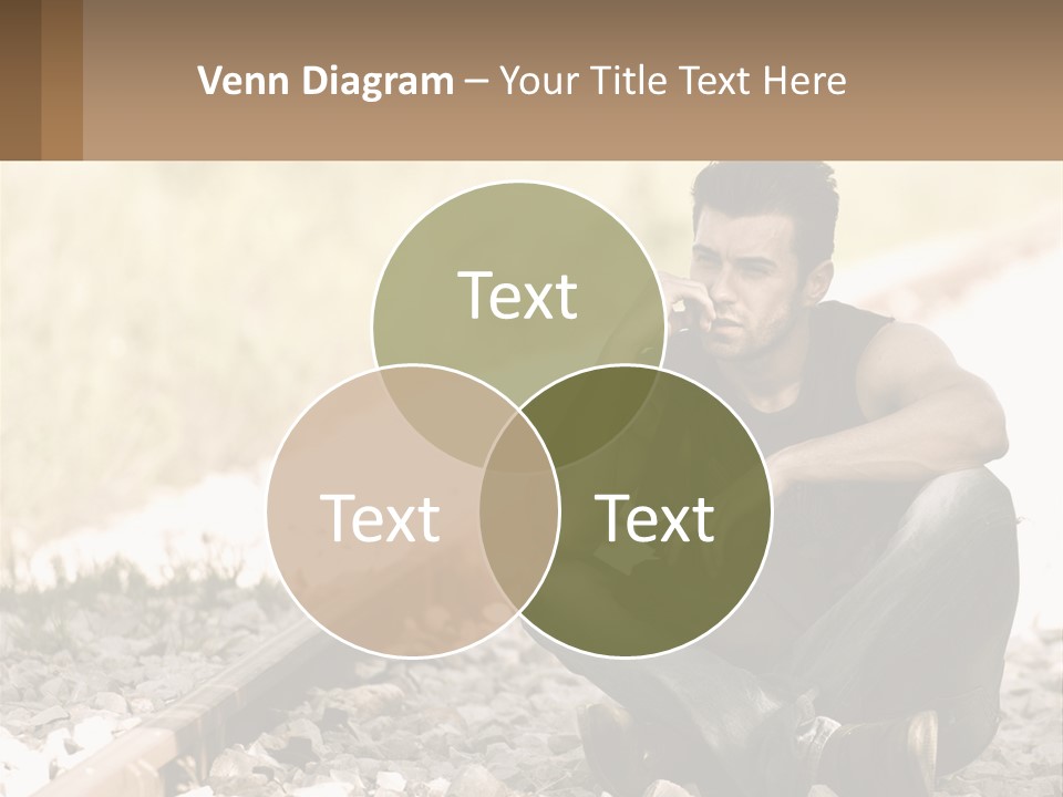 A Man Sitting On A Train Track Talking On A Cell Phone PowerPoint Template
