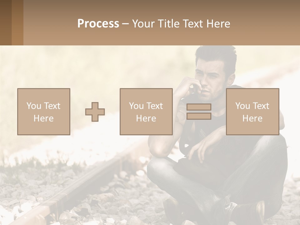 A Man Sitting On A Train Track Talking On A Cell Phone PowerPoint Template