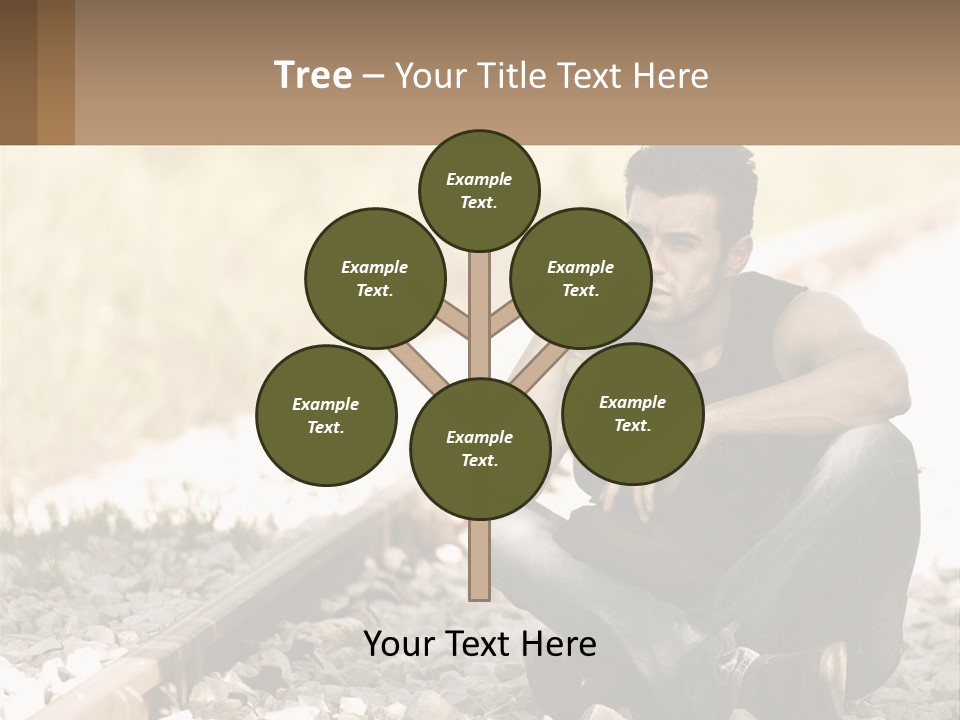 A Man Sitting On A Train Track Talking On A Cell Phone PowerPoint Template