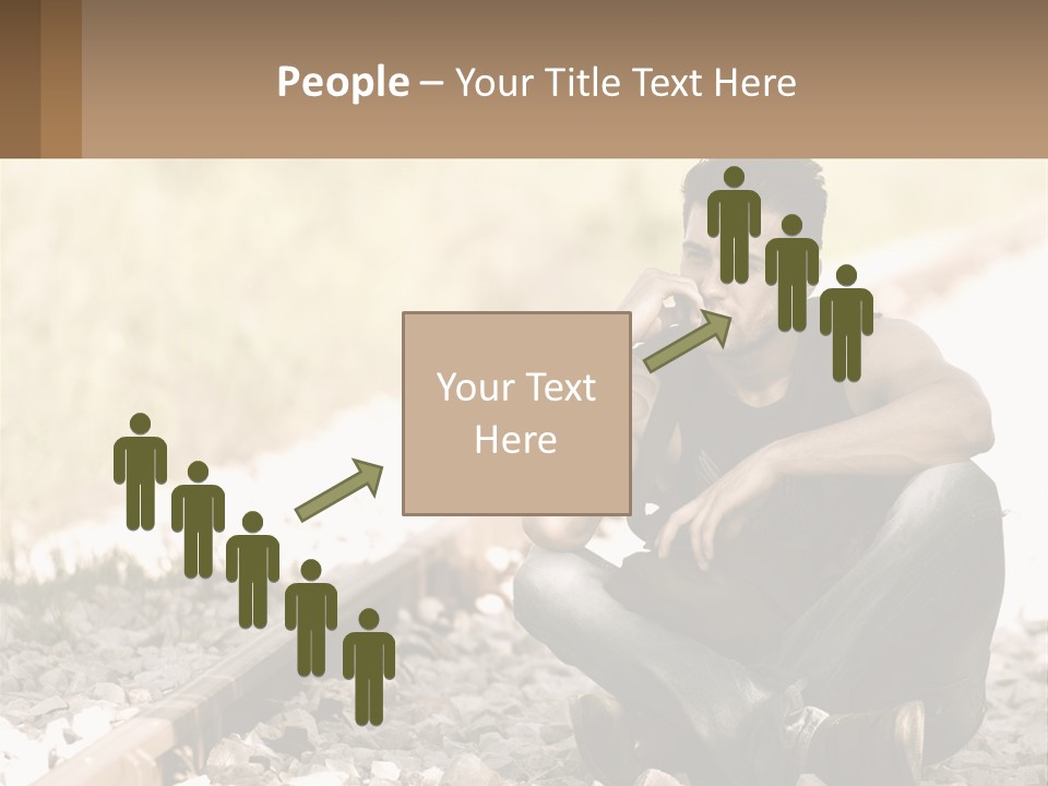 A Man Sitting On A Train Track Talking On A Cell Phone PowerPoint Template