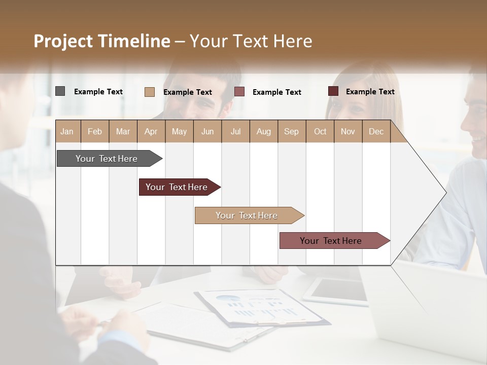 A Group Of People Sitting Around A Table Talking PowerPoint Template