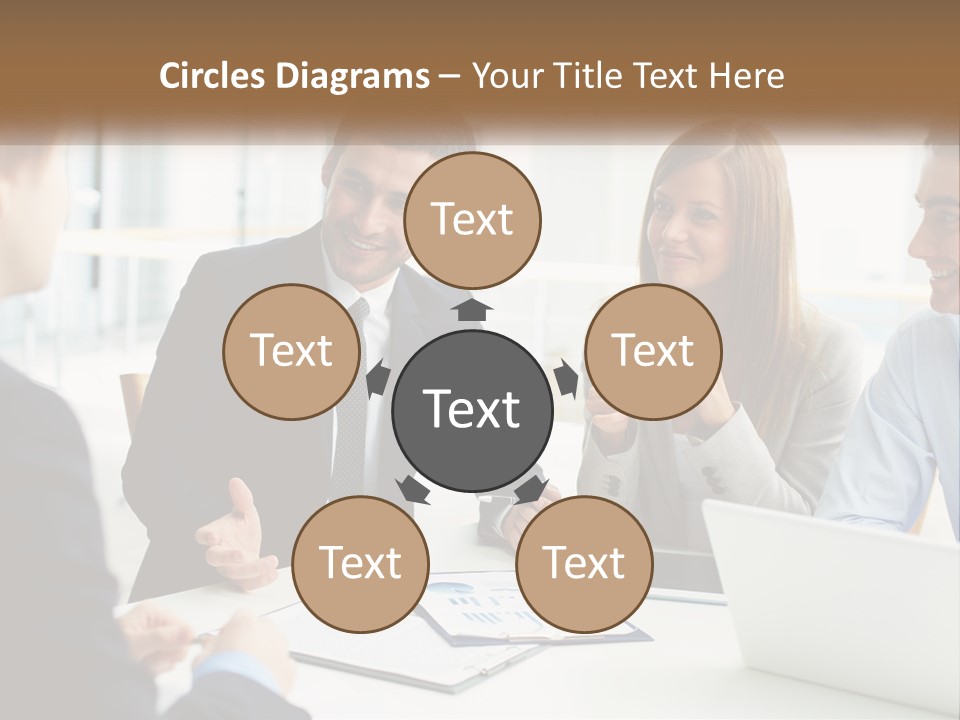 A Group Of People Sitting Around A Table Talking PowerPoint Template