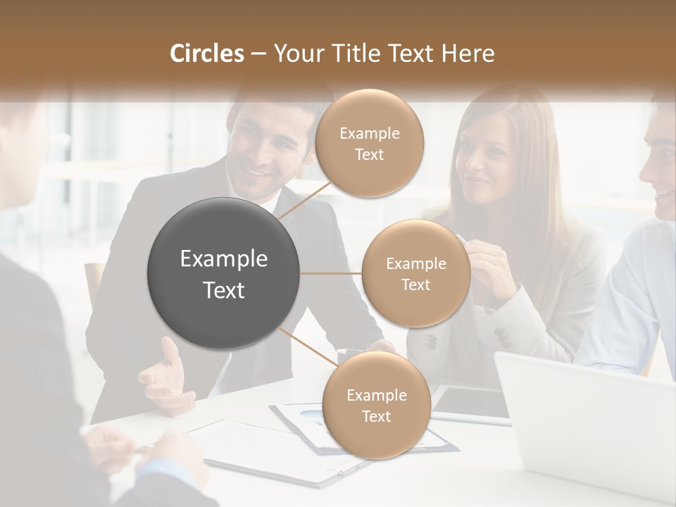 A Group Of People Sitting Around A Table Talking PowerPoint Template