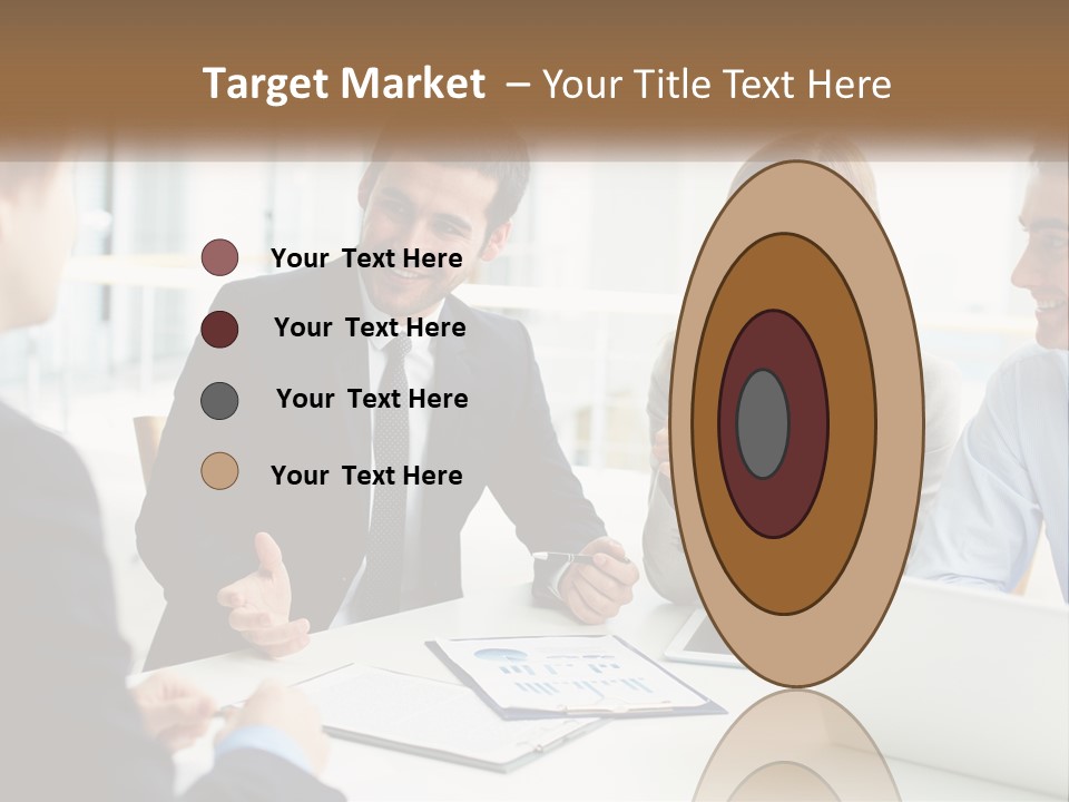 A Group Of People Sitting Around A Table Talking PowerPoint Template