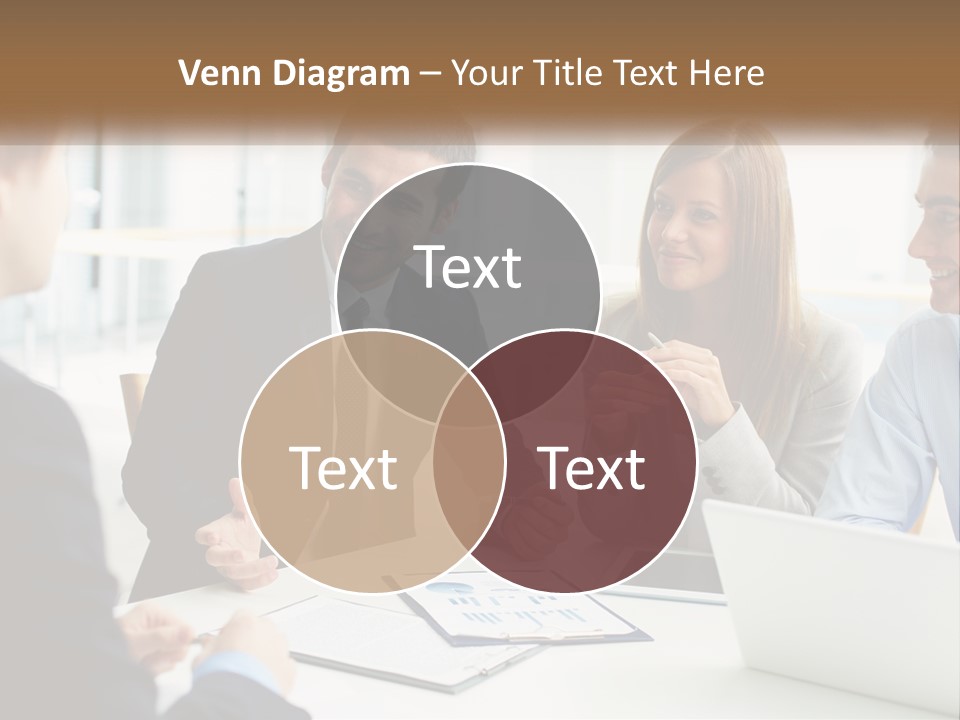 A Group Of People Sitting Around A Table Talking PowerPoint Template