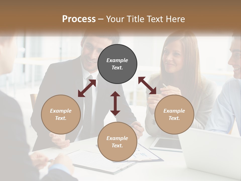 A Group Of People Sitting Around A Table Talking PowerPoint Template