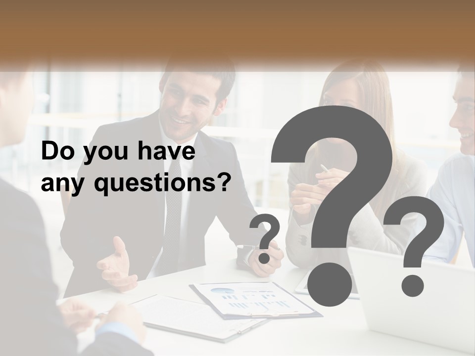 A Group Of People Sitting Around A Table Talking PowerPoint Template