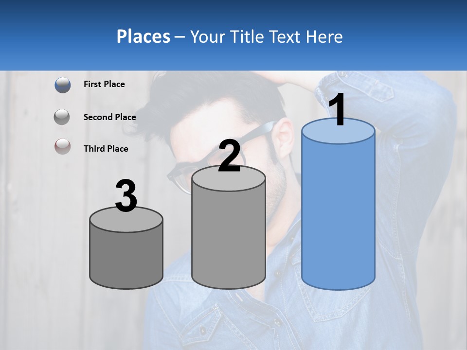 A Man Wearing Glasses And A Denim Shirt PowerPoint Template