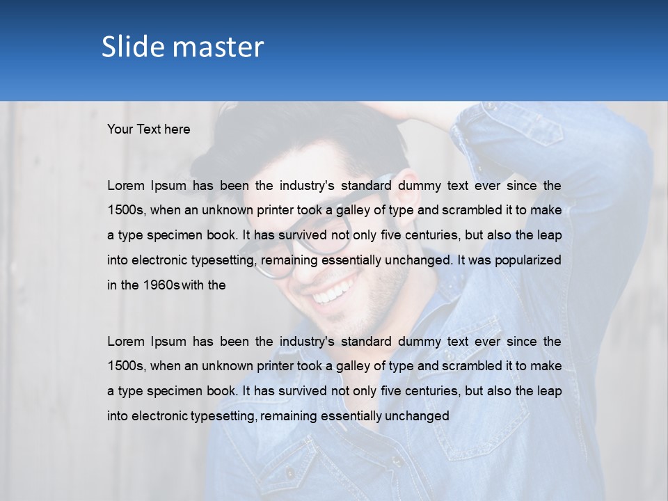 A Man Wearing Glasses And A Denim Shirt PowerPoint Template