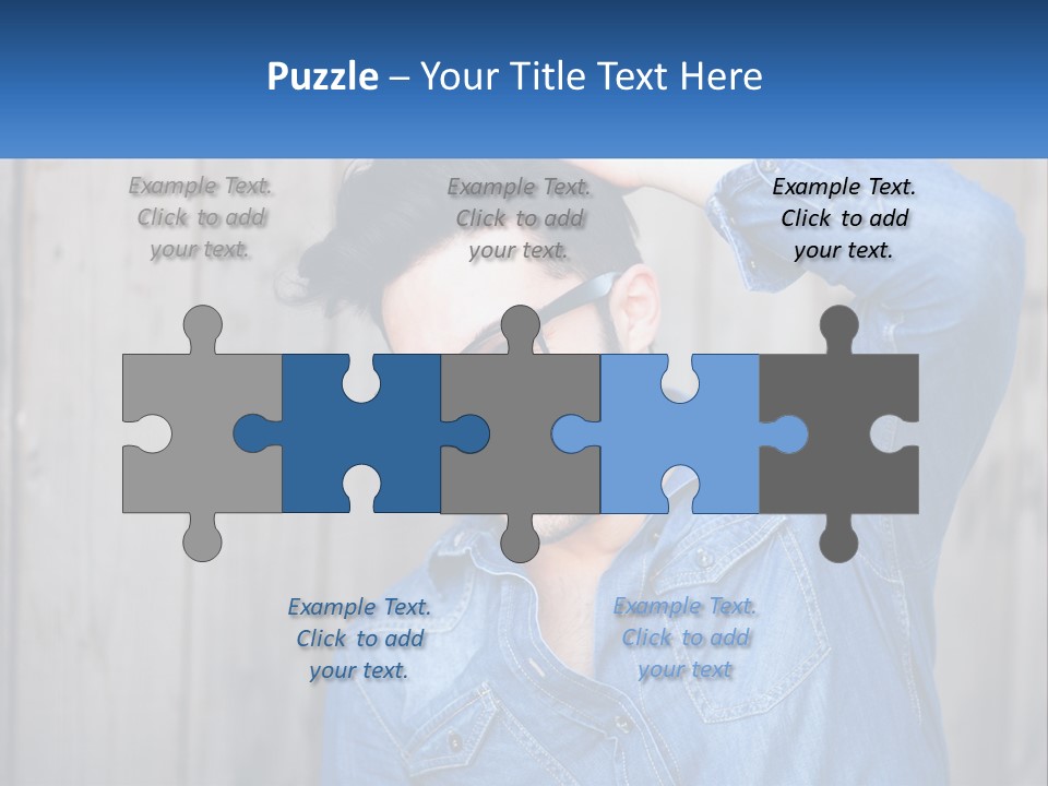 A Man Wearing Glasses And A Denim Shirt PowerPoint Template