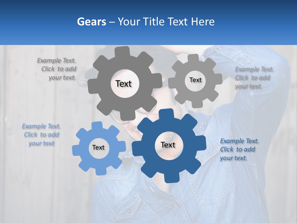 A Man Wearing Glasses And A Denim Shirt PowerPoint Template