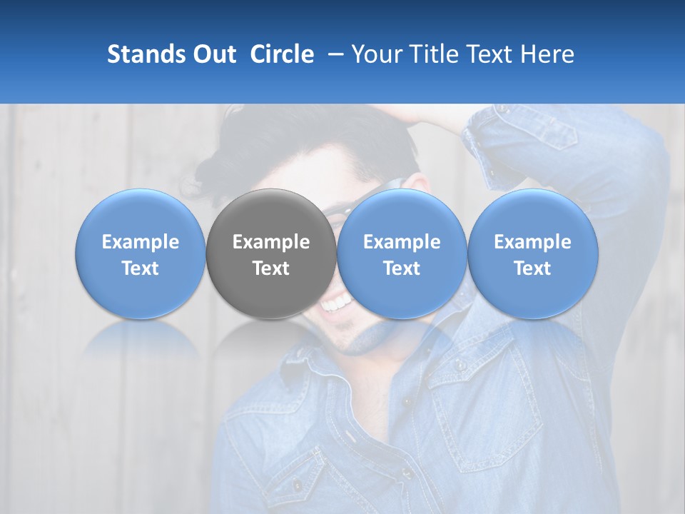 A Man Wearing Glasses And A Denim Shirt PowerPoint Template
