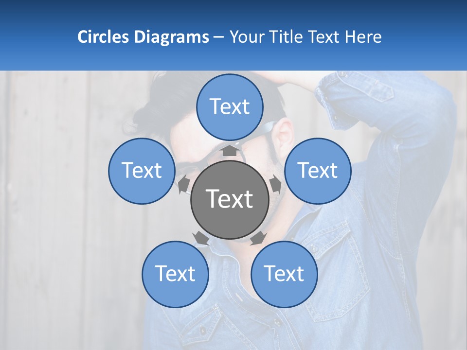 A Man Wearing Glasses And A Denim Shirt PowerPoint Template