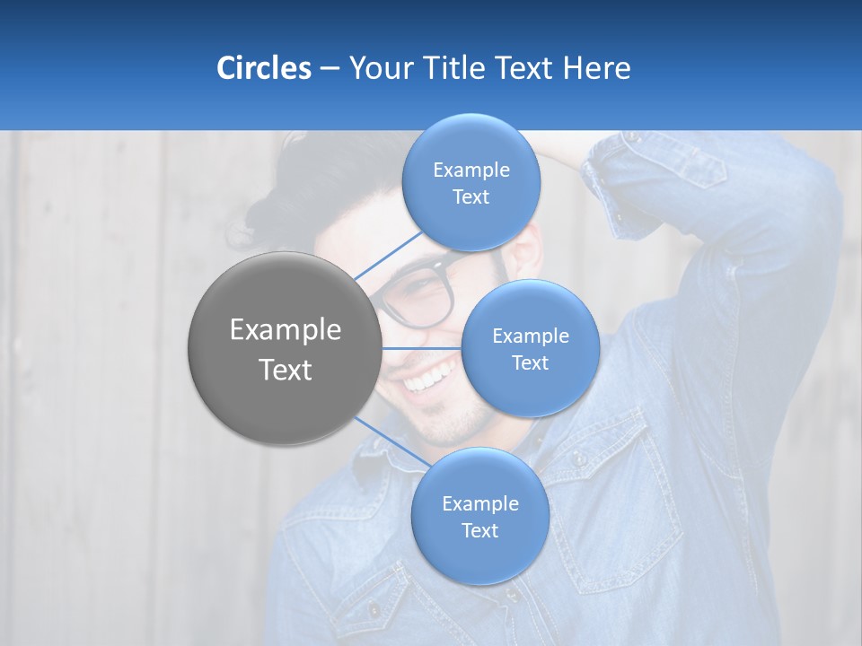 A Man Wearing Glasses And A Denim Shirt PowerPoint Template