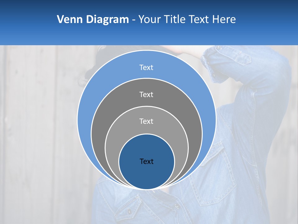 A Man Wearing Glasses And A Denim Shirt PowerPoint Template