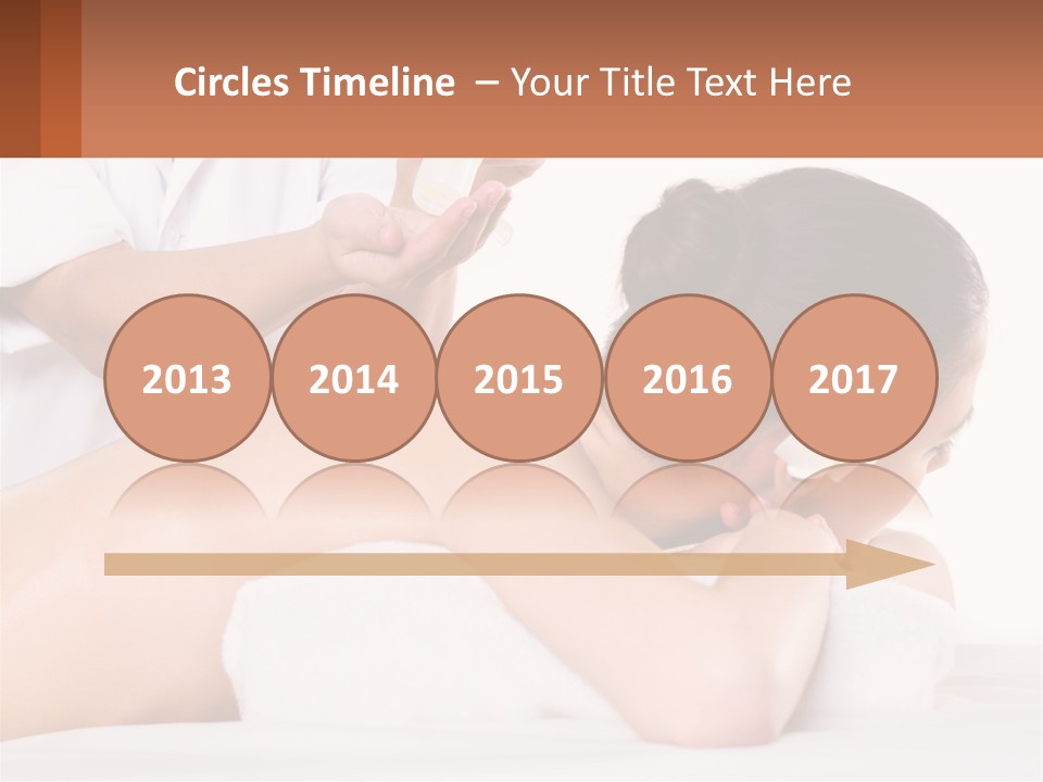 A Woman Getting A Back Massage With A Flower In Her Hair PowerPoint Template