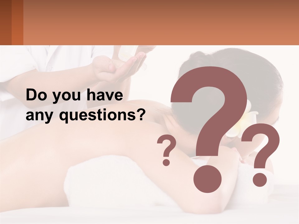 A Woman Getting A Back Massage With A Flower In Her Hair PowerPoint Template