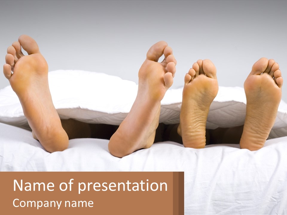 A Person Laying In Bed With Their Feet On A Pillow PowerPoint Template
