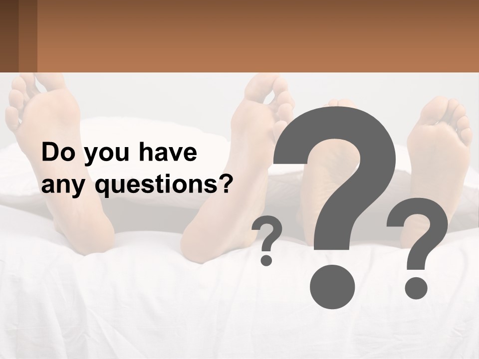 A Person Laying In Bed With Their Feet On A Pillow PowerPoint Template