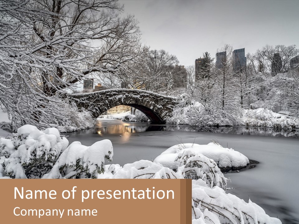 A Bridge Over A River With Snow On It PowerPoint Template