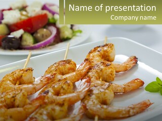 A White Plate Topped With Shrimp On Top Of A Table PowerPoint Template