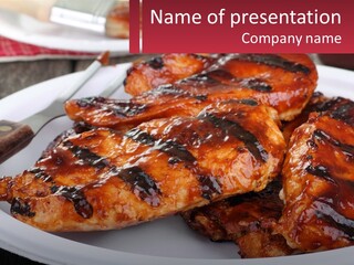 A White Plate Topped With Chicken Wings Covered In Bbq Sauce PowerPoint Template