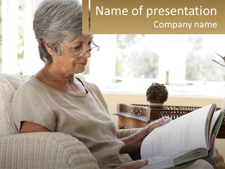 A Woman Sitting On A Couch Reading A Book PowerPoint Template