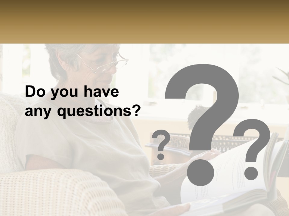 A Woman Sitting On A Couch Reading A Book PowerPoint Template