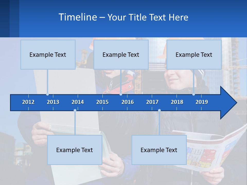 Two Men In Hard Hats Are Looking At A Blueprint PowerPoint Template