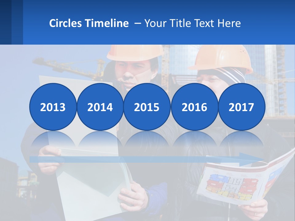 Two Men In Hard Hats Are Looking At A Blueprint PowerPoint Template