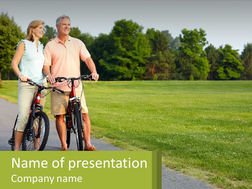 A Man And A Woman Standing Next To A Bike PowerPoint Template