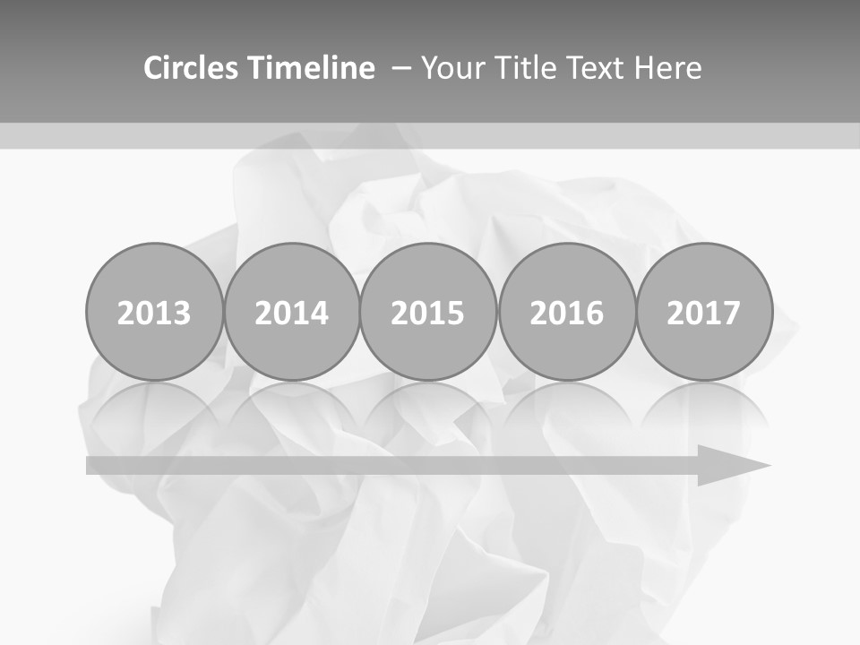 A Crumpled Ball Of Paper On A White Background PowerPoint Template